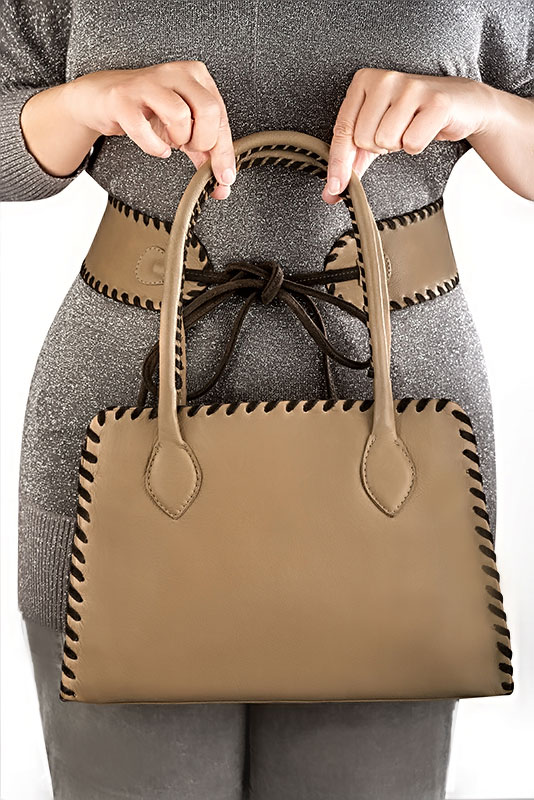 Camel beige and dark brown women's dress handbag, matching pumps and belts. Worn view - Florence KOOIJMAN